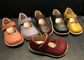 最初層の革靴の流行の子供の靴